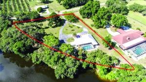 UPDATED POOL HOME LOCATED ON AN OXBOW WITH 594' OF RIVER FRONTAG