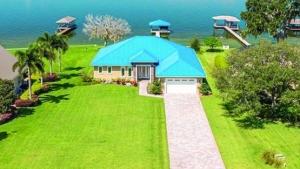 LOCATED ON THE SHORES OF LAKE JUNE ON AN OVERSIZED LOT